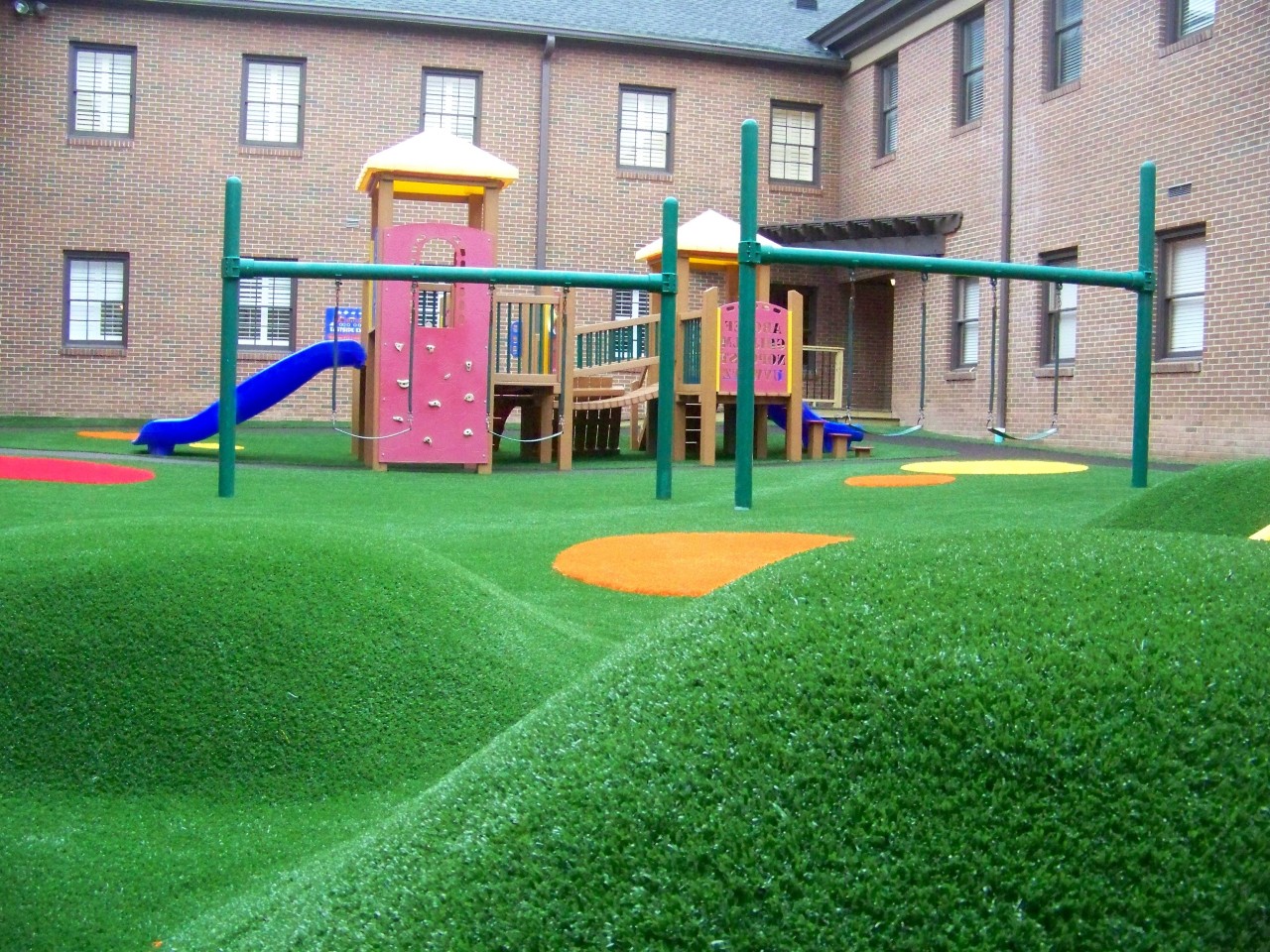 Hilly artificial turf playground by Southwest Greens of Fresno
